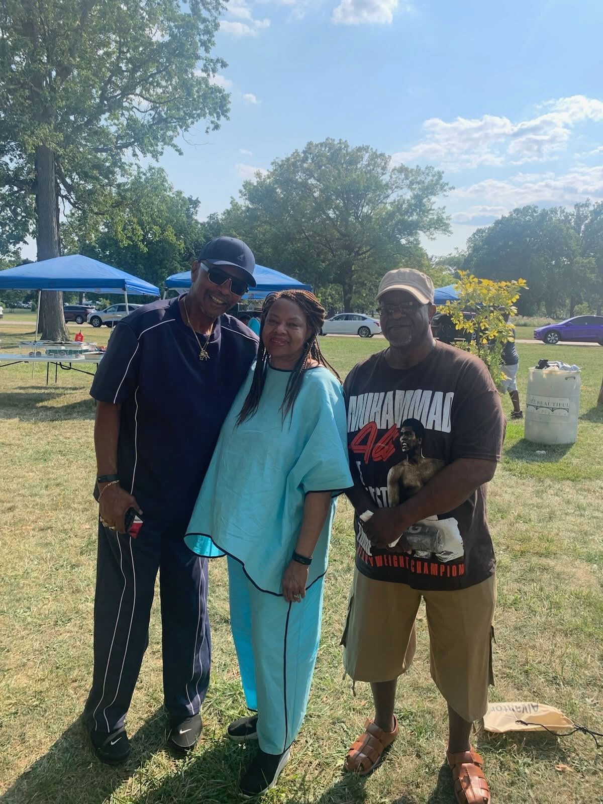 Family members posing together during the cookout